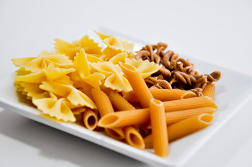 different organic pasta types in a bowl
