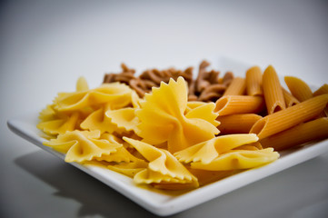 different organic pasta types in a bowl
