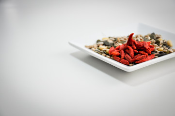 eating healthy goji and various seeds