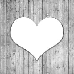 Fototapeta na wymiar frame heart-shaped and white wooden background