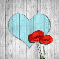 poppies  the background in wood and turquoise heart