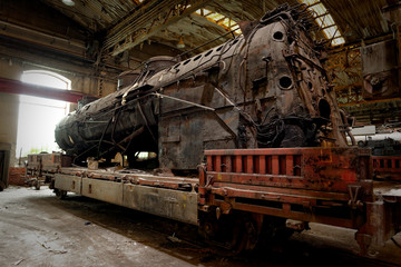Old industrial locomotive in the garage