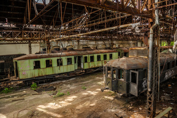 Fototapeta na wymiar Cargo trains in old train depot