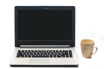 Coffee cup with laptop isolated on white