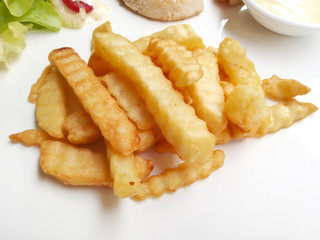 French fries on white dish