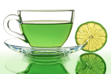 Green tea with lemon on a white background.