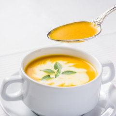 Pumpkin soup on served table