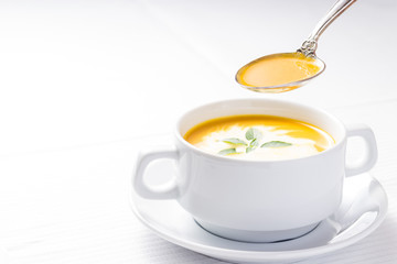 Pumpkin soup on served table