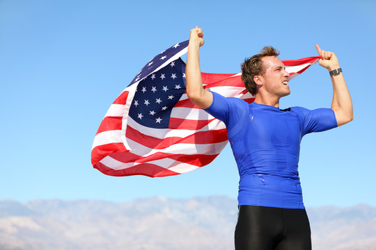 Success - winner athlete cheering with USA flag