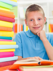 Smiling boy studying