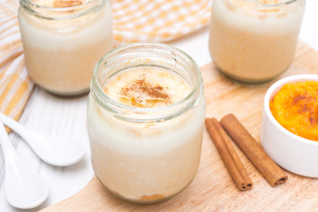 yogurt with spiced pumpkin puree in portioned jars
