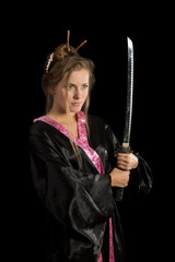 Girl in a kimono with a katana