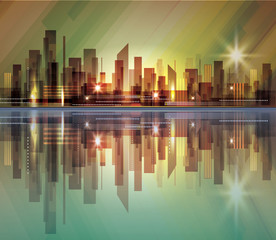 Fototapeta na wymiar City skyline at night with reflection in water