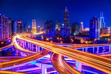 Foto op Plexiglas beautiful interchange overpass and city skyline © chungking