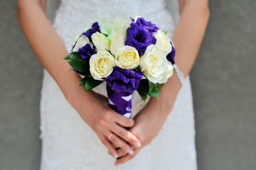 bride hold beautiful wedding bouquet