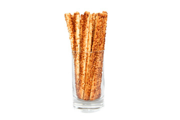 Fototapeta na wymiar pretzel sticks in a glass on white background
