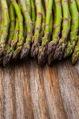 Asparagus on wooden texture