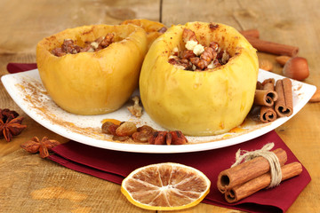 Baked apples on plate close up