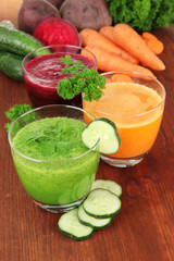 Fresh vegetable juices on table close-up