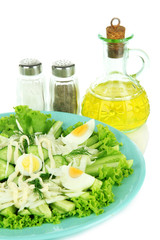 Delicious salad with eggs, cabbage and cucumbers, isolated
