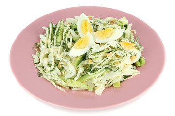Delicious salad with eggs, cabbage and cucumbers, isolated