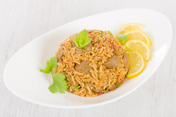 Mutton Byriani - Lamb and rice cooked with spices.