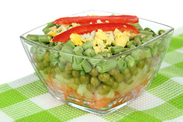 Tasty salad with fresh vegetables, isolated on white