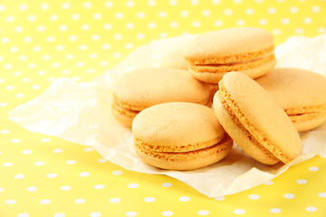 Gentle macaroons on table close-up