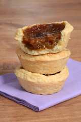 closeup stack of butter tarts © Michael Gray