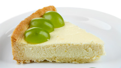 Slice of cheesecake with grape berries