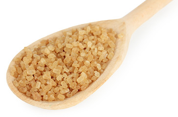 Brown sugar in spoon isolated on white