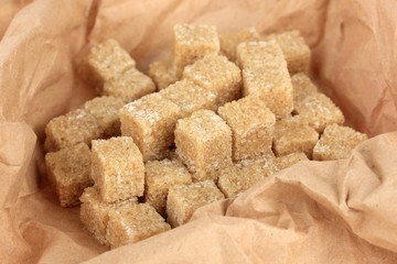 Brown sugar in paper close-up