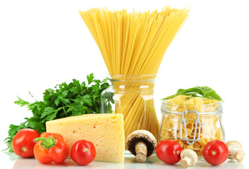 Different types pasta with vegetables isolated on white