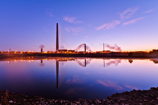 View Of Nickel Plant With Sunrise As Background