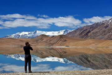 Photographer at Tso Kar lake in Ladakh, India