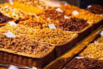 Dried fruits at the market (La Boqueria, Barcelona famous place)