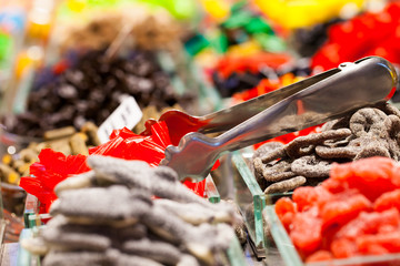 Market stall full of candys in La Boqueria Market.Barcelona