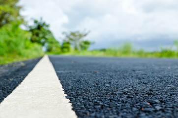 New asphalt road with nature background