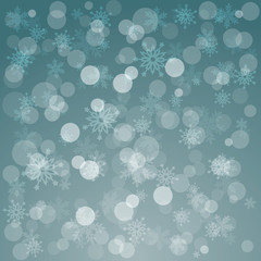 Naklejka premium Glowing shiny christmas background with snowflakes.