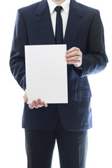 Businessman holding a white paper