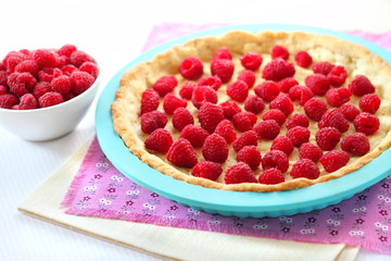 Cooking of tart with raspberry