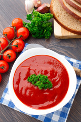 Tasty tomato soup with herbs