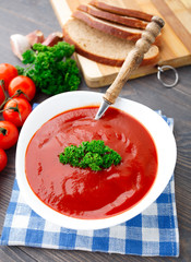 Tasty tomato soup with herbs