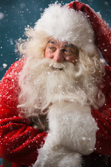 Photo of frozen Santa Claus outdoors in snowfall