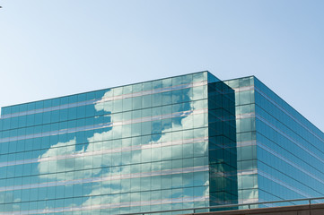 Modern Office Building Reflecting the Clouds