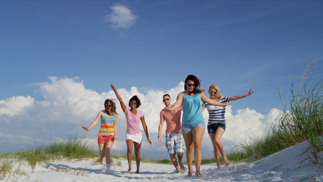 Multi Ethnic Teenagers Fun Beach Time Together