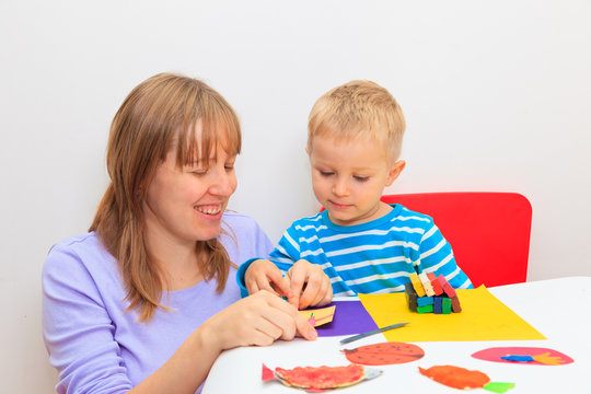 mother and son with play dough