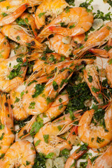 Fried shrimps with the garlic and the parsley