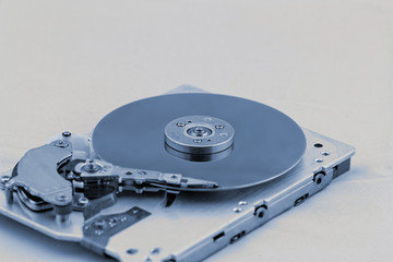 Open computer hard drive on white background