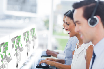 Call center workers at work on futuristic interfaces showing map